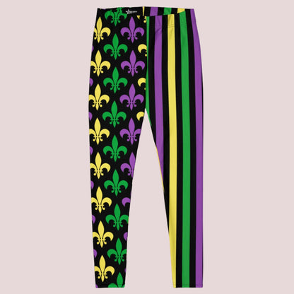 Bold and fun Mardi Gras leggings for women, designed in black with classic Carnival colors—green, purple, and yellow stripes down one leg and a stylized fleur-de-lis print on the other. Ideal for parade day in New Orleans or themed events in NOLA, these stretchy leggings offer stylish comfort and pair perfectly with matching toddler and youth sizes for family matching.