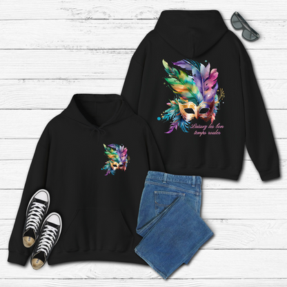 Image: Black Adult Mardi Gras Hoodie, printed on front and back. The front of the sweatshirt has a watercolor carnival mask, and the back features an oversized graphic of the same party mask with the text Laissez les on temps rouler, by jaecrece