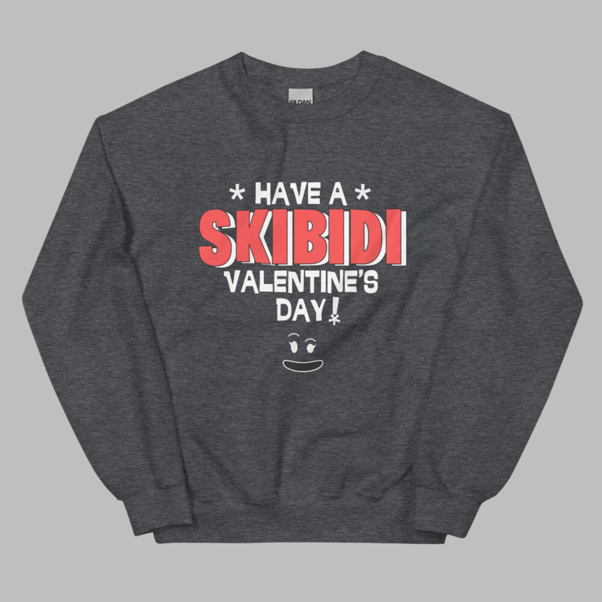 Men’s black or dark heather Skibidi sweatshirt with “Have a Skibidi Valentine’s Day!” printed boldly across the front. Perfect for meme dads who love toilet jokes, Rizz, and viral humor. Great for matching with your kid’s gamer shirt, this pullover comes in S–5XL and features cozy fleece, regular fit, and durability for everyday laughs. A hilarious Valentine’s Day shirt for dads who want to show off their meme game with their tween.