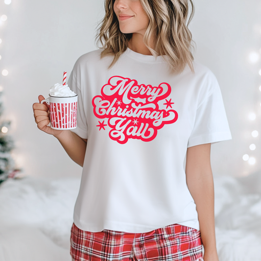 Celebrate the holidays Southern-style with this Merry Christmas Y’all adult t-shirt featuring bold red script. This Bella Canvas tee offers a unisex fit and soft cotton feel, perfect for festive gatherings, family photos, or cozy winter days. Ideal for anyone looking for Southern Christmas shirts, country Christmas shirts, holiday graphic tees for adults, or matching family Christmas t-shirts with rustic charm.