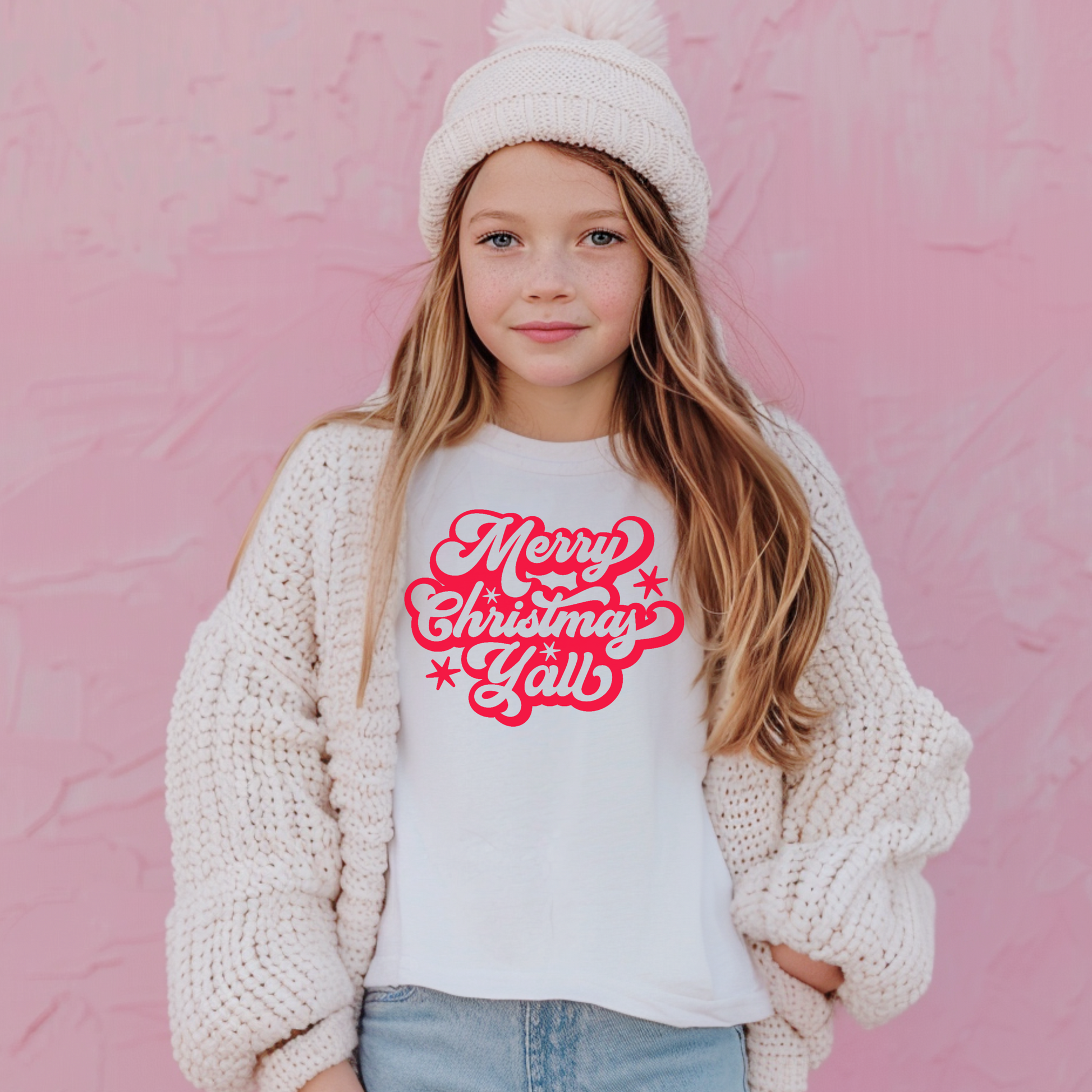 This youth Christmas T-shirt features “Merry Christmas Y’all” in bold red script, perfect for festive Southern kids’ outfits. Made from soft cotton with a relaxed fit, it’s ideal for school parties, photos, and family holiday gatherings. Matches with adult and toddler sizes for coordinated family Christmas looks. Great gift for kids who love holiday tees and Southern Christmas cheer, perfect for December events and cozy mornings.