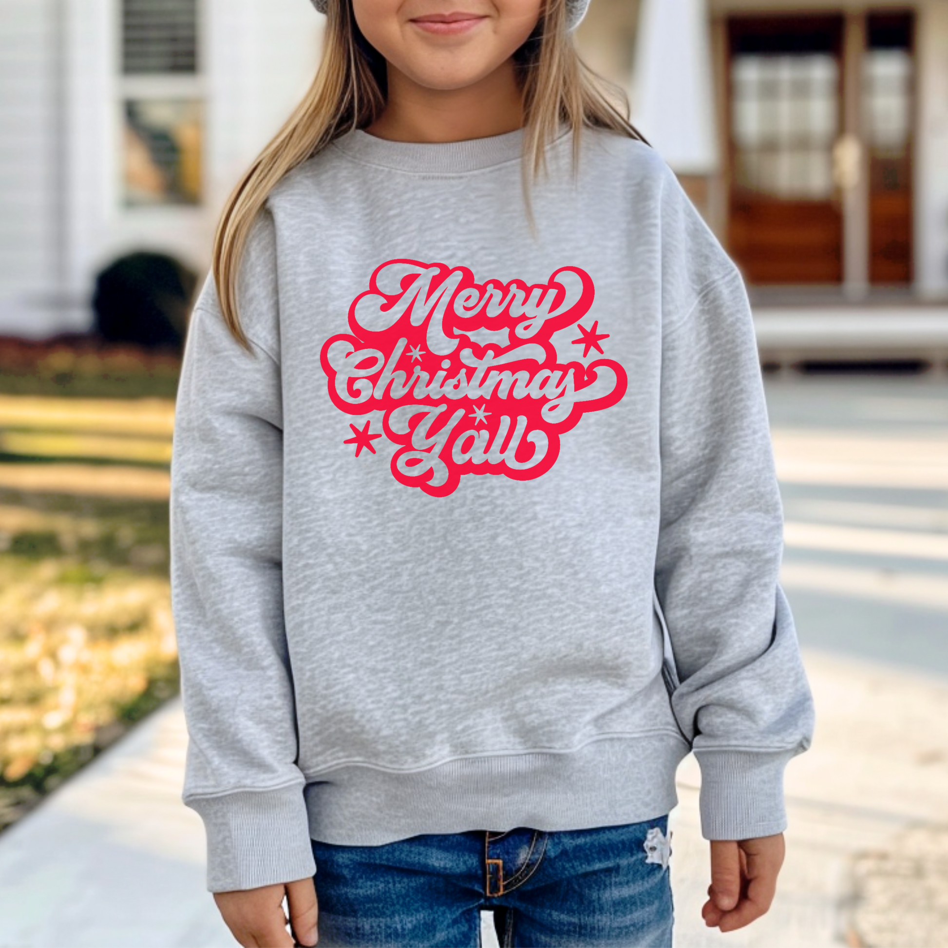Southern charm meets holiday joy with this kids "Merry Christmas Y’all" sweatshirt in bright red script. Made from durable, soft fabric, this pullover is perfect for youth Christmas parties, festive gatherings, or cozy nights by the fire. Part of a matching family collection for coordinated holiday style.