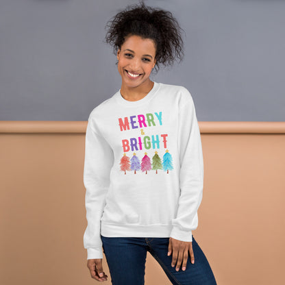 Make your season merry with our Merry and Bright Christmas sweatshirt on the classic Gildan 18000. Featuring colorful trees and festive lettering, this warm unisex sweatshirt is available in sizes S to 5XL and in white, navy, and black. Perfect for holiday parties, family photos, or cozy nights by the fire, this Christmas sweatshirt makes a stylish and thoughtful holiday gift for women, men, and anyone who loves cheerful winter fashion.