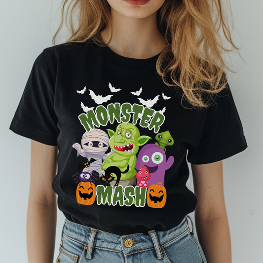 Monster Mash Halloween adult t shirt featuring playful cartoon monsters, mummy, trolls, black cat, pumpkins, bats and green slime lettering on a black or dark heather Gildan 2000 tee. Fun spooky season graphic shirt for women and men in sizes S through 5XL. Cute October outfit for pumpkin patch visits, Halloween parties, school events, trick or treating, haunted house nights, casual fall wear, funny Halloween shirt, spooky cute tee, monster mash graphic top.