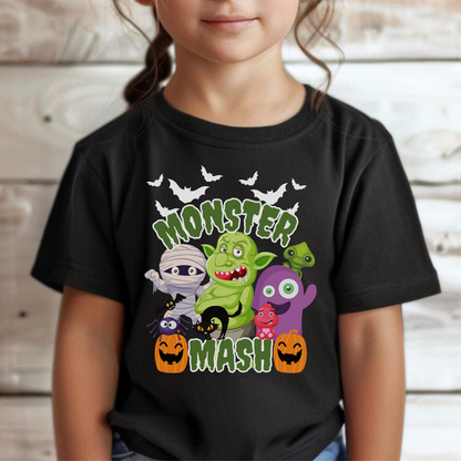 Monster Mash Halloween shirt featuring a fun cartoon style graphic with bats, zombies, trolls, mummy, ghost, black cat, and pumpkins arranged on a black Bella Canvas tee. The design includes green slime lettering that says Monster Mash, making it a playful Halloween shirt for kids and adults, perfect for pumpkin patch visits, trick or treating, school parties, and family matching Halloween outfits.