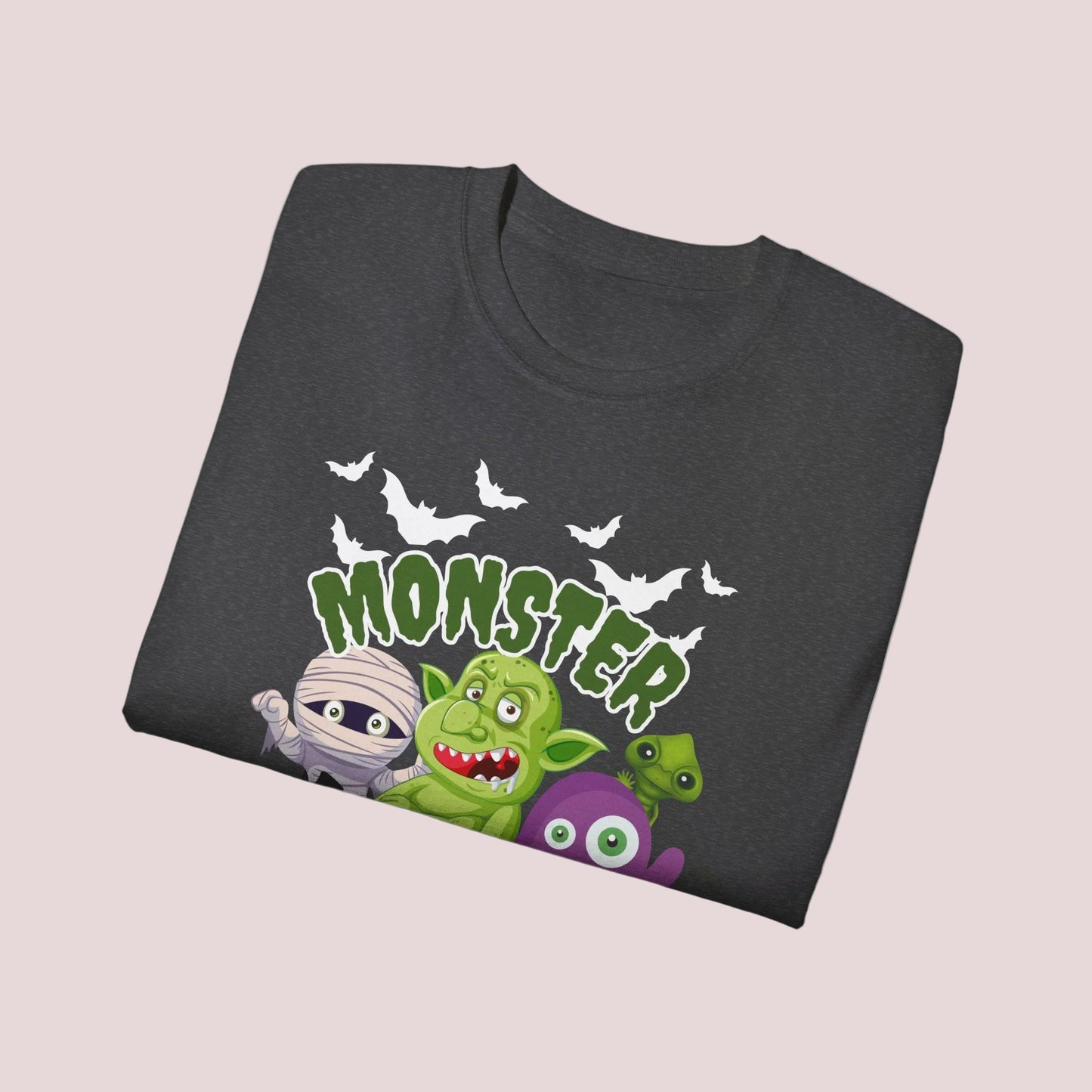 Monster Mash adult Halloween shirt with playful spooky cartoon design featuring bats, trolls, pumpkins, mummy and black cat on black or dark heather cotton tee. Green slime lettering adds bold Halloween style. Unisex sizes S through 5XL. Great gift for Halloween fans, October birthdays, party hosts, teachers, moms and dads. Cute spooky season shirt for casual fall outfits, pumpkin patch trips, fun holiday events.