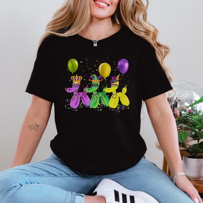 Celebrate Mardi Gras like a true New Orleanian in this Balloon Dog T-shirt with a trio of colorful dogs in green, purple, and gold, all set against a black background and sprinkled with confetti. Whether you're headed to a French Quarter bash or simply embracing Carnival season in spirit, this unisex tee brings joy and personality in sizes XS–5XL.