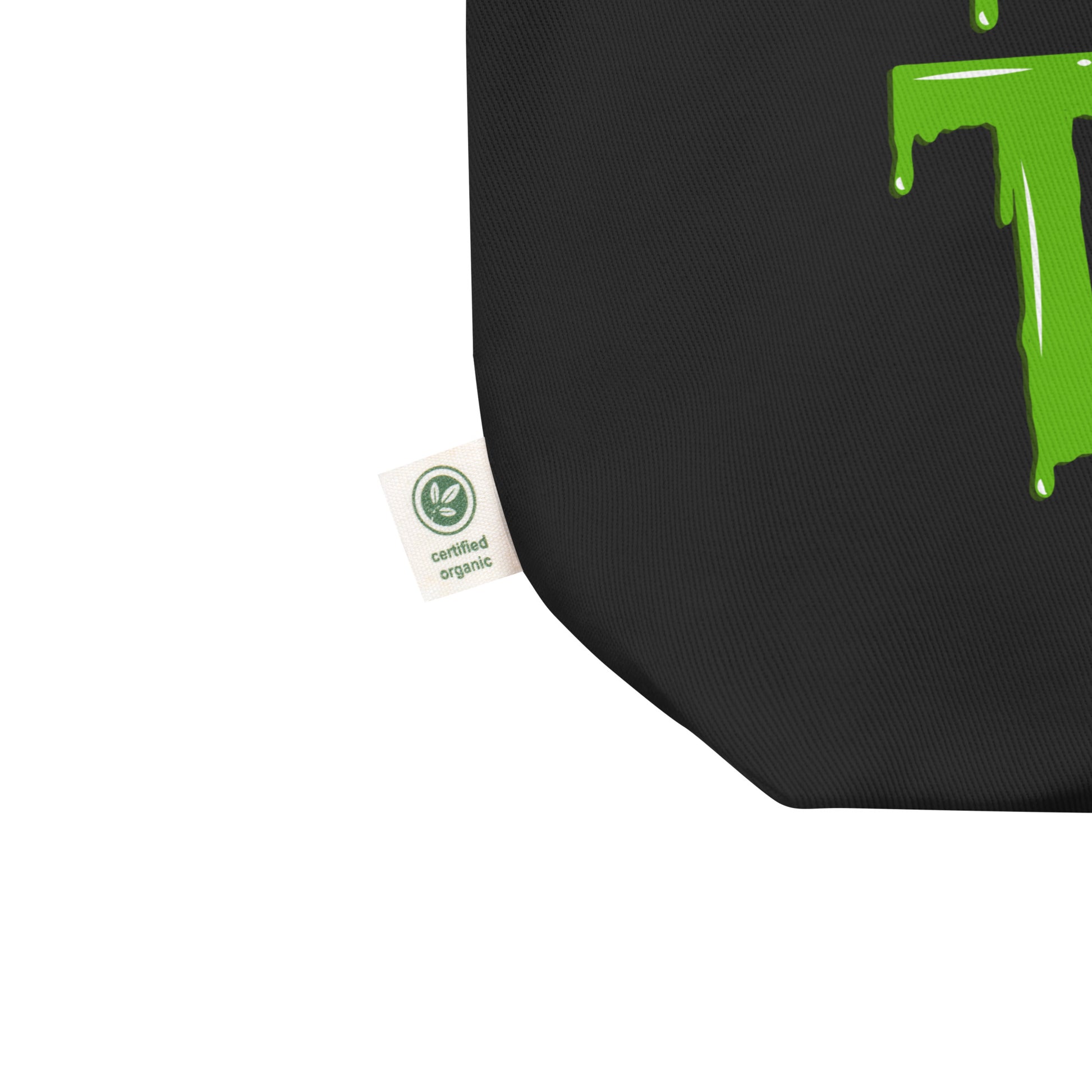 Black organic cotton Trick or Treat Tote Bag with green slime lettering, the ultimate Halloween candy bag for eco-friendly spooky fun. Spacious and sturdy, this reusable tote is designed to carry heavy candy hauls, books, groceries, or essentials. A festive and sustainable choice for trick-or-treating, haunted house outings, or pumpkin patch trips. Durable straps and roomy size make it a practical Halloween gift and everyday carryall.