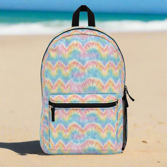 Pastel tie dye backpack for school, travel, and everyday use featuring a soft watercolor swirl pattern in pink, blue, purple, and mint. This colorful aesthetic backpack is perfect for teens, tweens, and students who love fun fashion accessories. Lightweight and durable with adjustable straps and roomy storage, this tie dye school bag works as a bookbag, laptop backpack, or carry-on travel bag. Cute backpack for girls, trendy teen backpack, pastel tie dye bookbag, colorful school backpack, aesthetic backpack