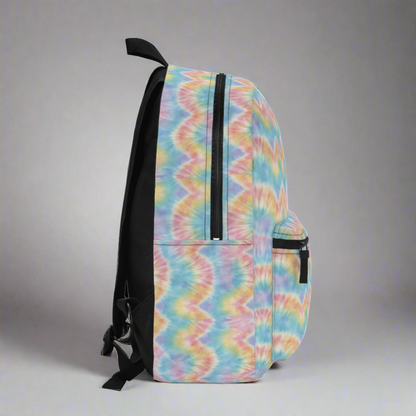 Side detail of pastel tie dye backpack highlighting the colorful swirl design and spacious structure. This trendy aesthetic backpack is designed for students, teens, and travelers who want a stylish yet functional bag. The soft pastel tie dye pattern gives a fun retro vibe while the roomy interior holds books, tech, and daily essentials. Cute tie dye school backpack, colorful pastel bookbag, aesthetic teen backpack, lightweight travel backpack, trendy tie dye bag for school.