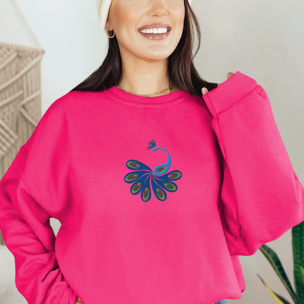 Image: Add a splash of boho charm to your outfit with this embroidered women’s sweatshirt featuring a vibrant peacock design. The detailed feather work and earthy colors make it ideal for cool-weather layering or lounging in style. Great for gifting, weekend wear, or artistic expression, this sweatshirt celebrates creativity and comfort in equal parts, by jaecrece.