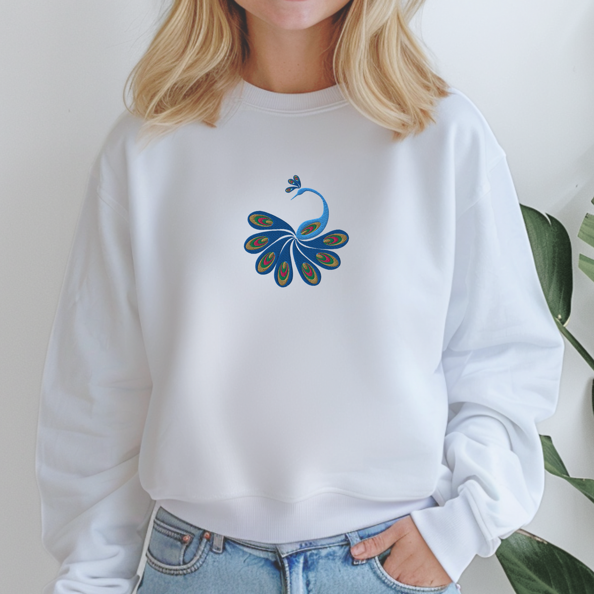 Image: A charming peacock embroidered women’s pullover, ideal for those who love animal motifs and cottagecore aesthetics. This cozy sweatshirt makes a wonderful fall staple, crafted with artistic flair and soft, breathable fabric. Whether for a casual outfit or a creative teacher look, this nature-inspired piece adds elegance and comfort to your wardrobe, by jaecrece.