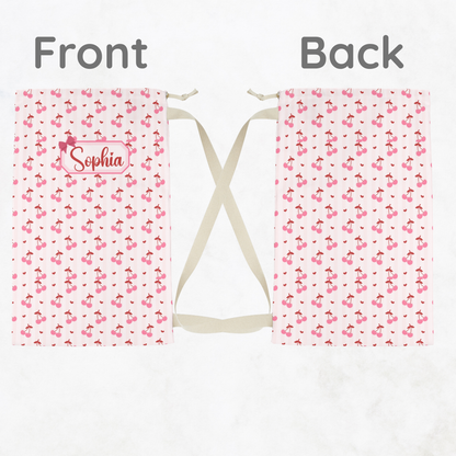 Custom coquette cherry laundry bag featuring a playful all over cherry design and personalized name detail. The large drawstring sack provides plenty of room for clothing, blankets, and linens, making it an ideal companion for dorm rooms, sleepovers, camp adventures, and weekend travel. Designed to combine style and function, this personalized laundry bag coordinates beautifully with matching travel accessories and makes a memorable gift for birthdays, graduations, and back to school.
