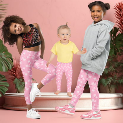 Soft stretch Pink Bow Coquette leggings for girls, toddler 2T–7 through youth 8–20, with charming gingham bow print, perfect for everyday play, school, dance class, or special occasions, made-to-order for quality, comfort, and style, easy to pair with tees, dresses, or cozy sweaters for whimsical, feminine looks for toddlers, tweens, and teens.