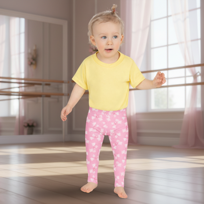 Girls leggings toddler 2T–7 and youth 8–20, featuring playful pink coquette bow print, soft four-way stretch fabric, smooth microfiber for all-day comfort, perfect for school, birthday gifts, dance class, casual outfits, or family matching sets, made-to-order with attention to detail for toddlers, tweens, and teens who love fun, stylish leggings.