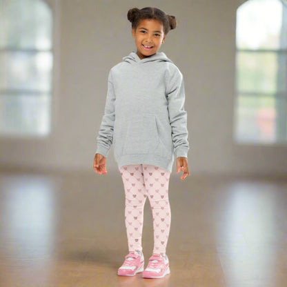 Image: Pink Hearts Toddler Girls Yoga Leggings. These light pink leggings feature a trendy criss cross diamond pattern and pink hearts, perfect for toddlers and little girls. Available in sizes 2T-7, with matching adult yoga pants for stylish mommy and me outfits, by jaecrece