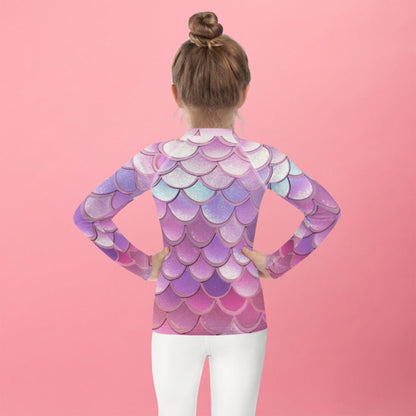 Image: Mermaid Scales Girls rash guard. This swimwear is in toddler and girl sizes, and is part of a family matching swimwear collection. It features mermaid scales in shades of pink, blue and purple, by jaecrece