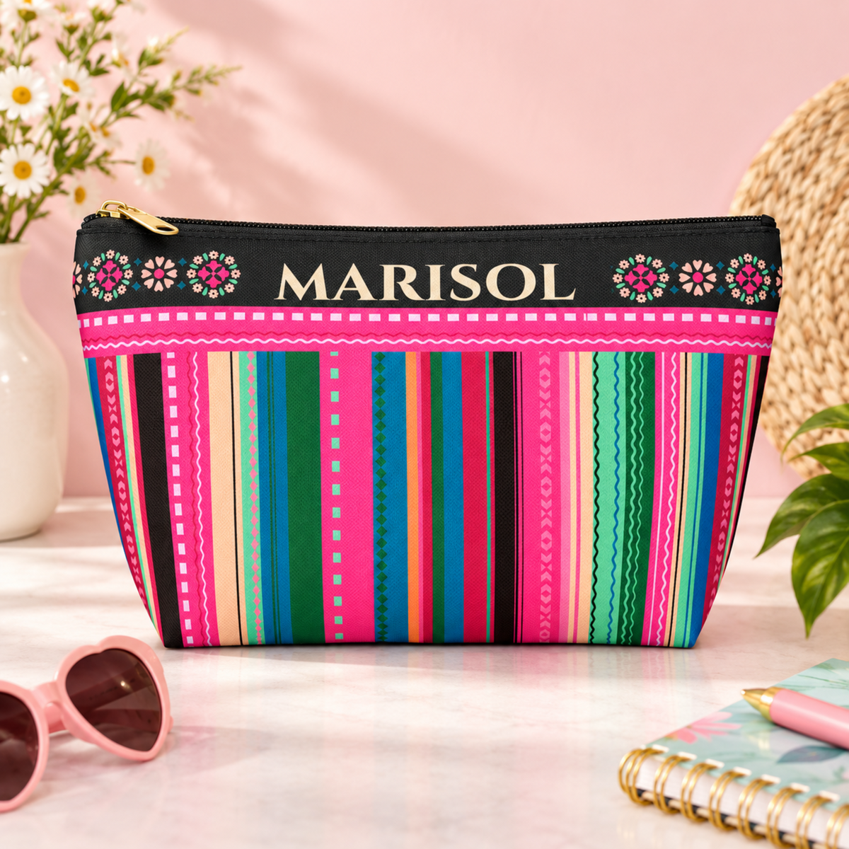 Personalized Mexican inspired makeup bag featuring a colorful serape inspired pattern, floral details and custom name, making a festive gift for Hispanic Heritage Month, Cinco de Mayo, Mexican American celebrations, birthdays, girls trips and anyone who loves vibrant cultural inspired accessories