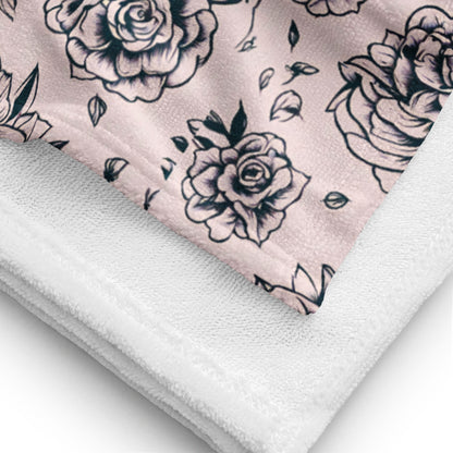 Stacked Pink Tattoo Rose Beach Towels showing bold floral tattoo rose pattern, oversized 30×60″ absorbent towels with soft cotton blend and terry backing, perfect for beach days, pool lounging, vacations, spring break trips, summer lake trips, coordinating family swimwear, stylish summer accessory, travel-friendly pool towel, statement floral design for women and girls.