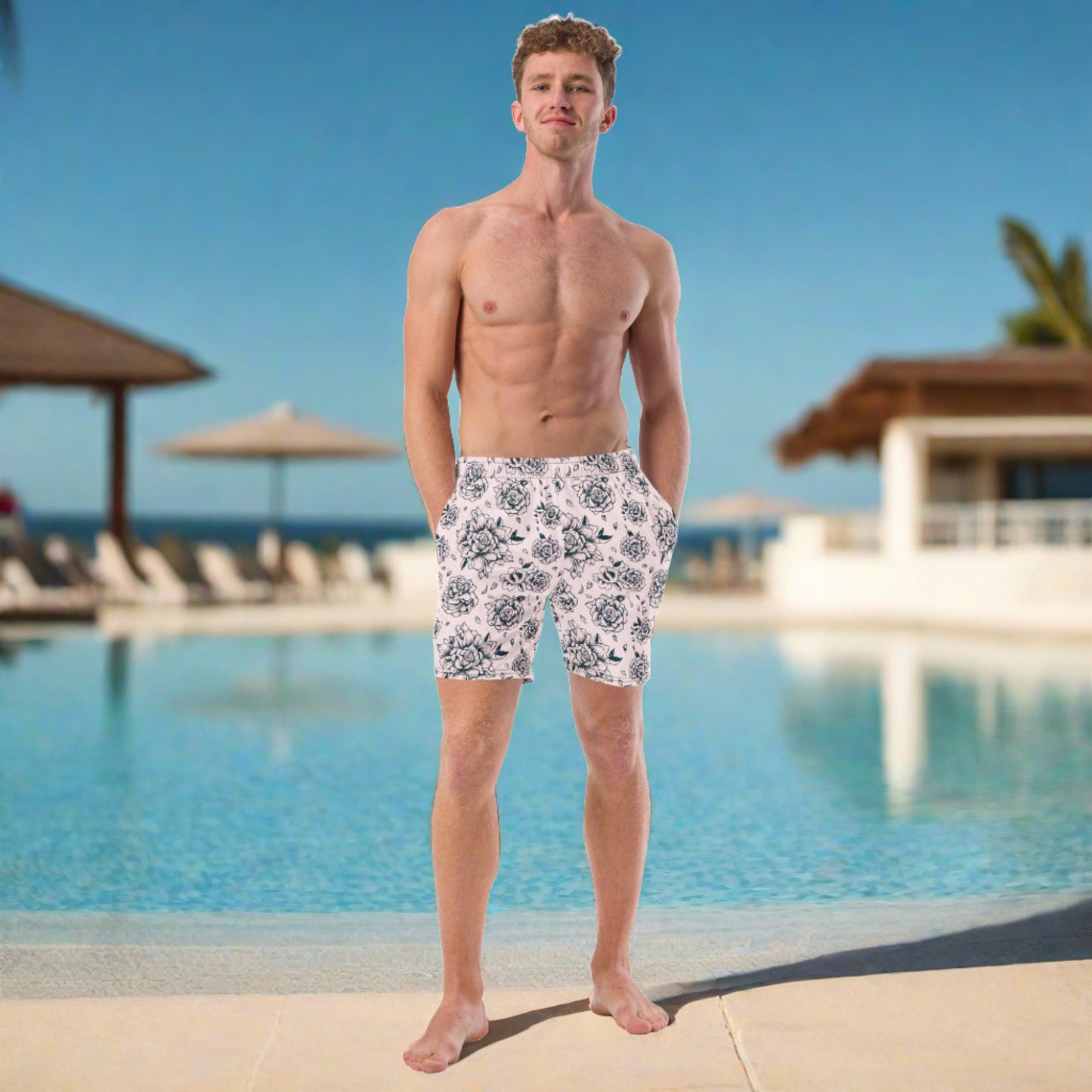 Pink Tattoo Roses Men’s Swim Trunks featuring bold black tattoo-style roses on a vibrant pink background, made with 91% recycled polyester for sustainable summer fashion. Designed with UPF 50+ protection, anti-chafe mesh liner, and side pockets, these edgy swim trunks are perfect for family matching beachwear. Great for dads, uncles, or anyone wanting bold, eco-friendly swimwear for poolside fun or family vacations.