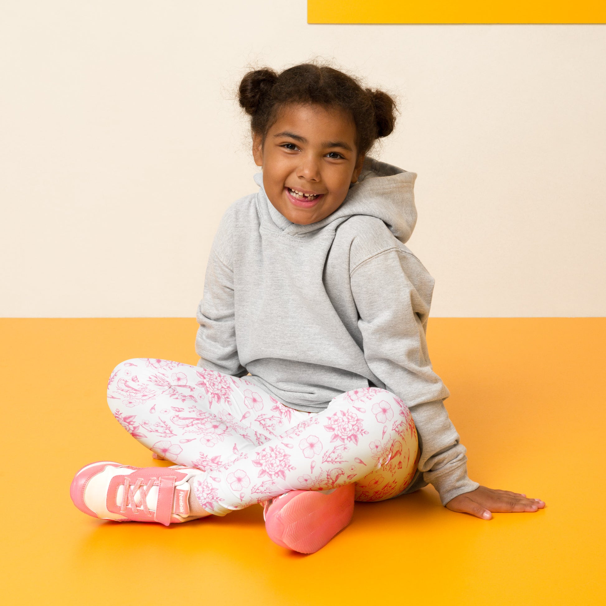 Image: Toddler wearing pink toile leggings with a vintage floral design, perfect for spring outfits, birthday parties, or matching family photo shoots. These leggings are soft, stretchy, and come in toddler sizes 2T to 7. Ideal for girls who love comfort and parents who want timeless style, part of a matching family set that includes youth and adult sizes, by jaecrece.