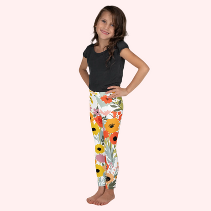 Image: Pretty floral leggings for toddler girls in a bold watercolor wildflower print. Designed for everyday comfort and seasonal flair, they come in sizes 2T to 7 and are perfect for Easter, spring birthdays, and park days. These leggings are part of a coordinating mommy and me collection—match with big sister or mom for a sweet spring look, by jaecrece.