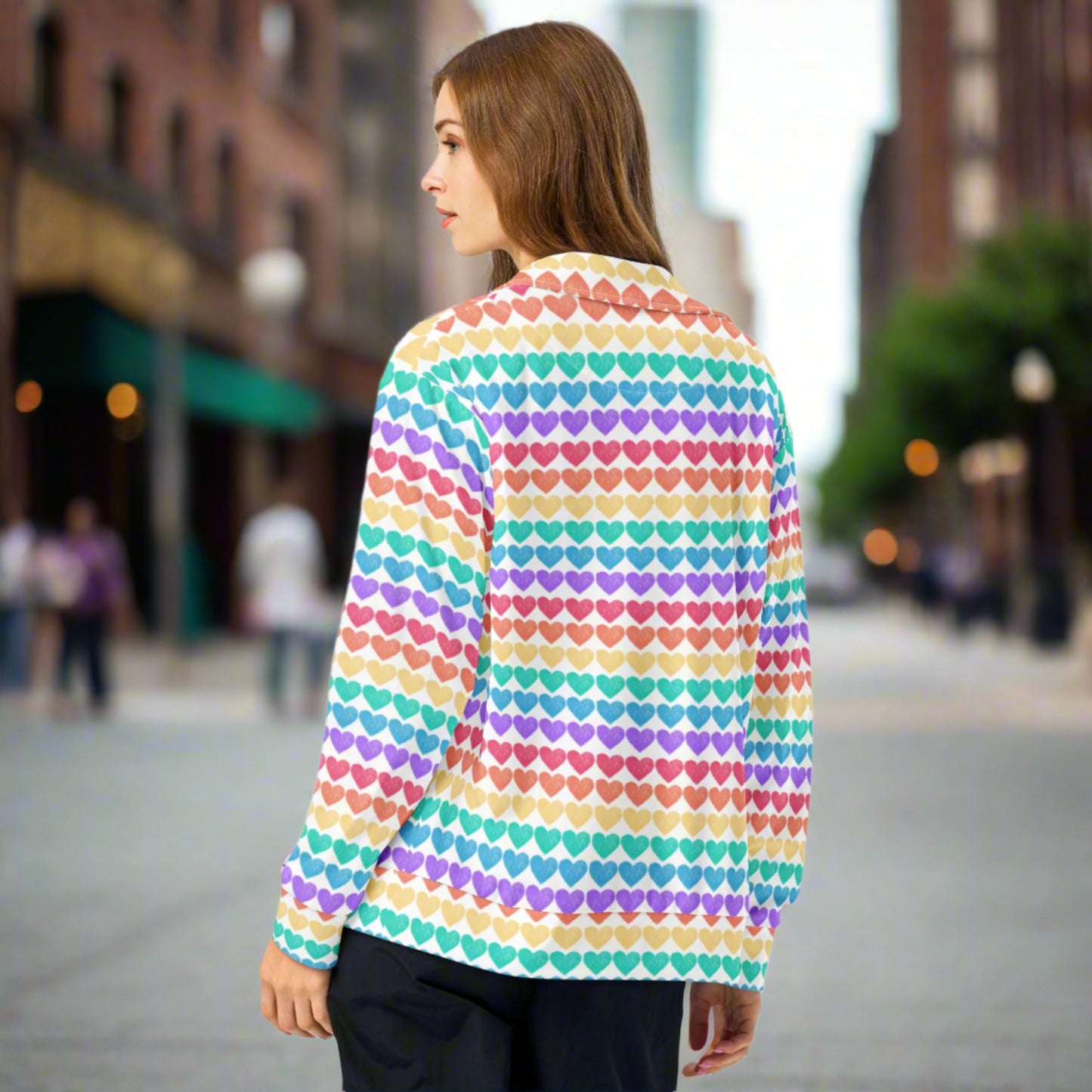Designed for self-expression, this track jacket features a playful rainbow heart pattern on a clean white background. Available in unisex adult sizes 2XS–6XL, it's perfect for layering during Pride, music festivals, or everyday wear. Whether paired with the matching leggings or worn alone, it radiates joy, love, and style.