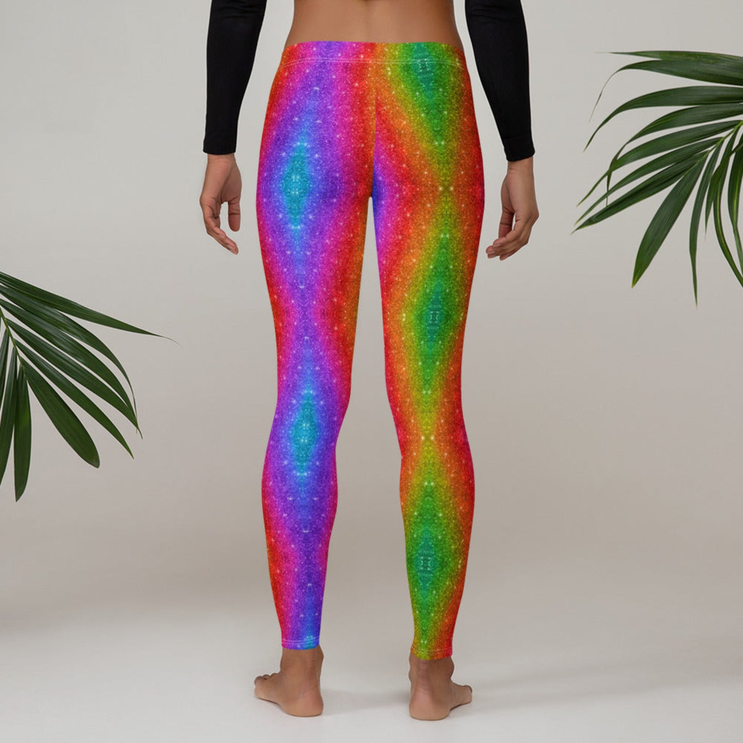 Women's activewear leggings with holographic rainbow glitter swirl print, designed for bold fashion moments at Pride, parades, or fitness events. These eye-catching leggings are full-length with a mid-rise waist, made of soft and stretchy microfiber fabric. Also available in toddler and youth sizes for fun family matching sets perfect for festivals, races, or just spreading joy.