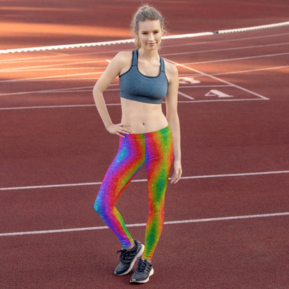 Vibrant rainbow glitter swirl women's leggings perfect for Pride parades, Mardi Gras outfits, or festival fashion. These full-length, mid-rise leggings feature a holographic-style print with bold colors that pop in every setting. Great for matching family looks, these stretchy, comfy leggings are a colorful choice for 5Ks, rave wear, and statement street style. Ideal for LGBTQ+ fashion, colorful fitness looks, or vibrant everyday wear.