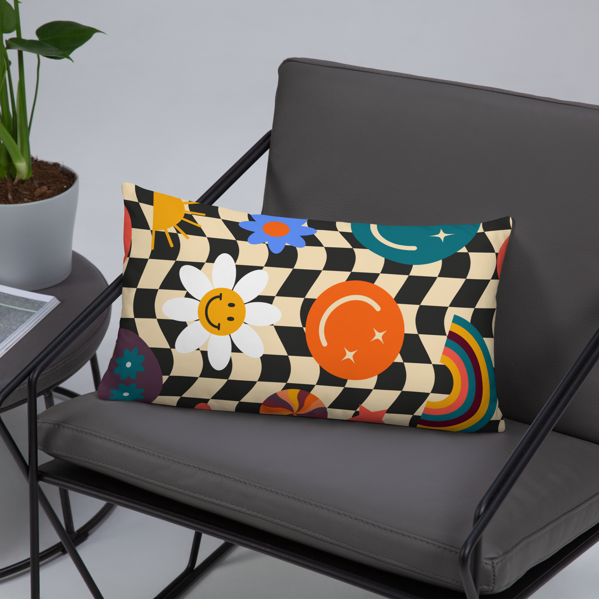Rectangular Y2K smiley face checkerboard throw pillow styled on a modern gray chair, highlighting the bold black and tan check pattern with cheerful smiley icons. Retro design adds playful soft girl aesthetic and nostalgic energy to teen bedrooms, dorm rooms, or cozy living spaces. Double-sided printed decorative pillow brings comfort, vibrant style, and personality, making it a trendy accent piece and fun gift for friends or décor lovers.