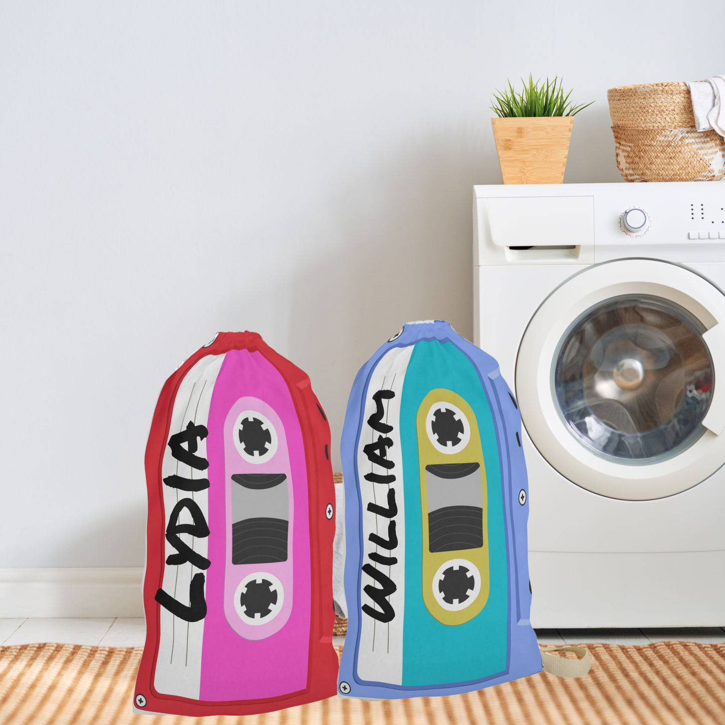 Red and blue personalized laundry bags covered in colorful cassette tape artwork. A custom name is incorporated into the print, creating a unique storage solution for everyday use. The 18 x 29 inch bag features a woven carrying strap and gathered drawstring closure. Ideal for storing clothing, linens, towels, camp gear, and travel essentials while bringing retro style to bedrooms and dorm rooms.