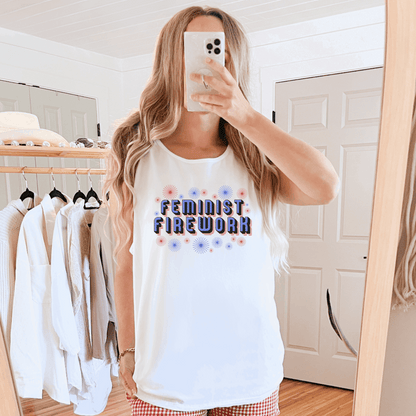 Red, white, and blue Feminist Firework tank top with retro graphics and a bold message, perfect for wearing to 4th of July events, women’s marches, or summer festivals. Made with Comfort Colors garment-dyed cotton, this relaxed tank celebrates independence and gender equality with a vintage aesthetic. Ideal for feminists, allies, and socially conscious shoppers looking for cute protest wear.