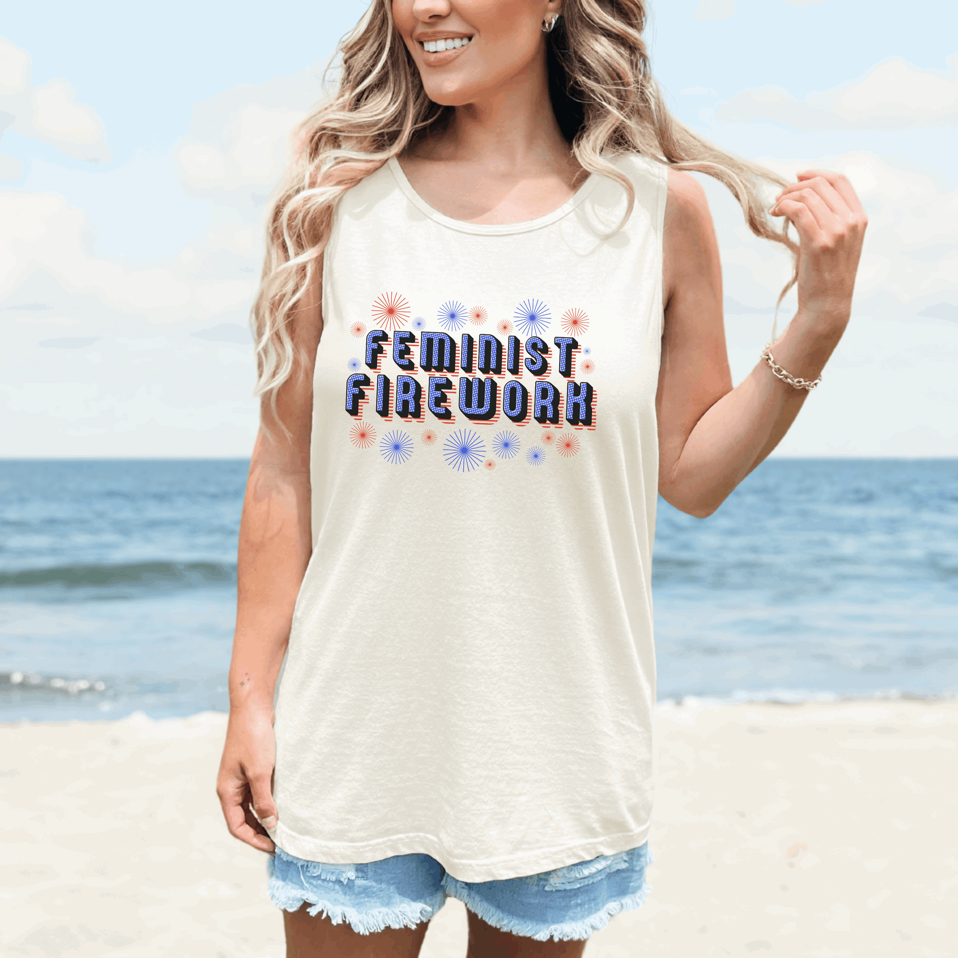 Retro-style Feminist Firework tank top in red, white, and blue, designed to make a statement for Independence Day and beyond. Featuring a bold fireworks graphic and feminist message, this Comfort Colors tank top is a must-have for 4th of July outfits, women’s rights rallies, or summer concerts. Soft, garment-dyed cotton provides a worn-in feel, perfect for sunny days or activist streetwear.