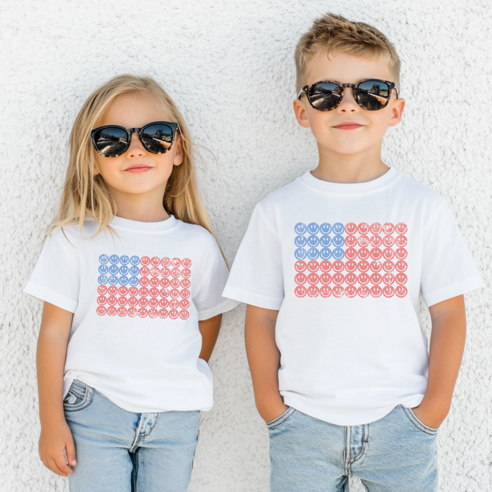 Youth smiley face American flag t shirt featuring a red white and blue graphic design, cute kids patriotic shirt for 4th of July celebrations, summer parties, and family matching outfits