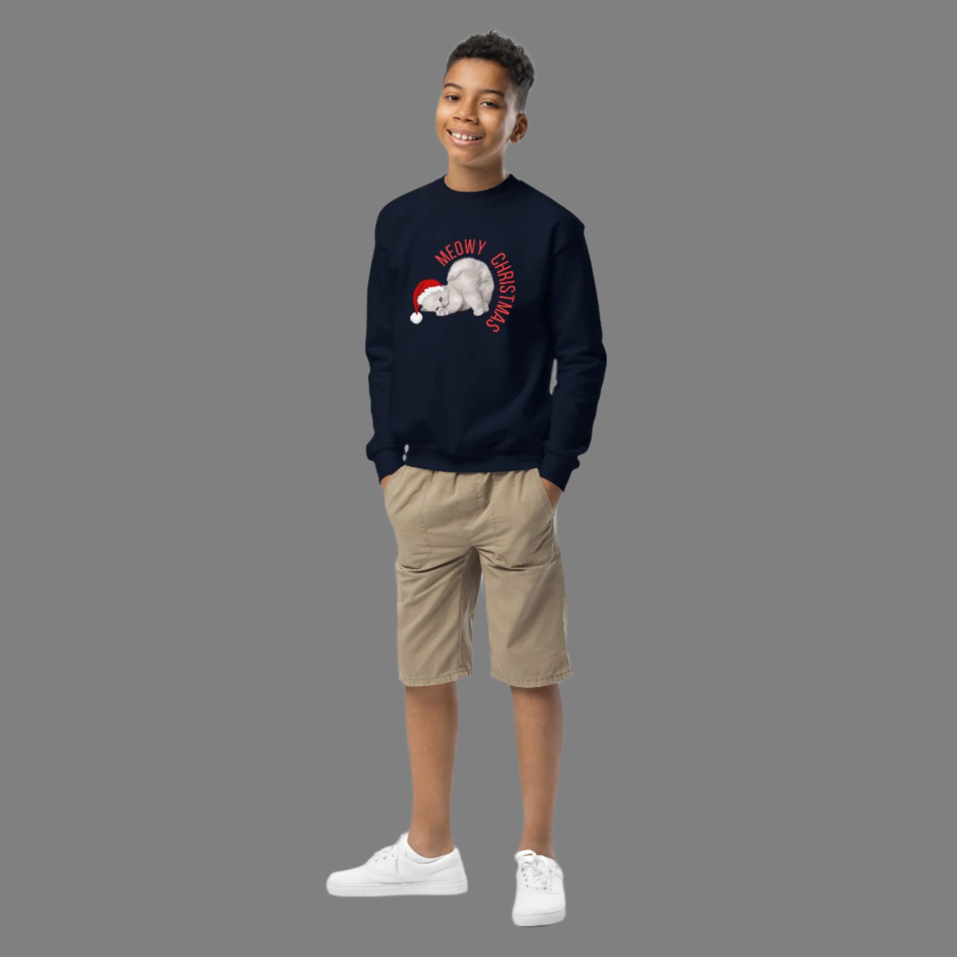 Kids and tweens will love this Youth Meowy Christmas Sweatshirt, sized XS–XL, for its cute holiday cat graphic and festive charm. Designed for comfort and style, this funny cat Christmas sweater is perfect for holiday class parties, family events, and cold-weather fun. A great gift for young animal lovers, this cozy pullover spreads joy and purrs wherever it goes during the holiday season.