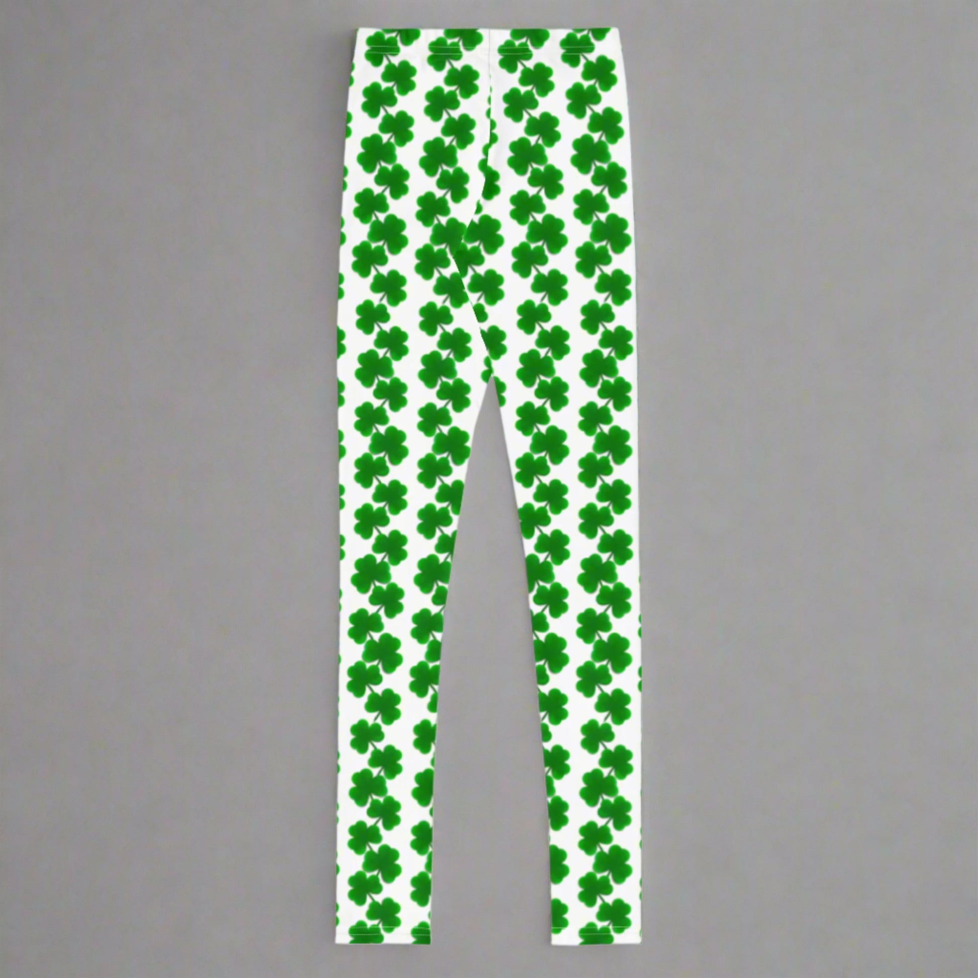 Image: St Patricks Day Shamrock Leggings in Tween and Teen Girls Sizes 8, 10, 12, 14, 16, 18, 20. Shamrock leggings for girls in youth sizes 8–20 with a white background and cheerful green clover chain pattern. These stretchy, festive leggings are great for celebrating St. Patrick’s Day at school, at home, or in family photos. Designed for comfort and movement, they’re perfect for kids who want fun and fashionable holiday wear with a dash of Irish spirit.