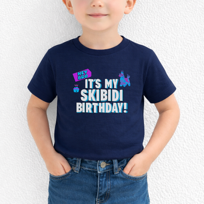 Funny Skibidi birthday shirt for toddlers featuring bold blue and white It’s My Skibidi Birthday lettering with colorful birthday graphics, perfect for a playful toddler birthday outfit or party