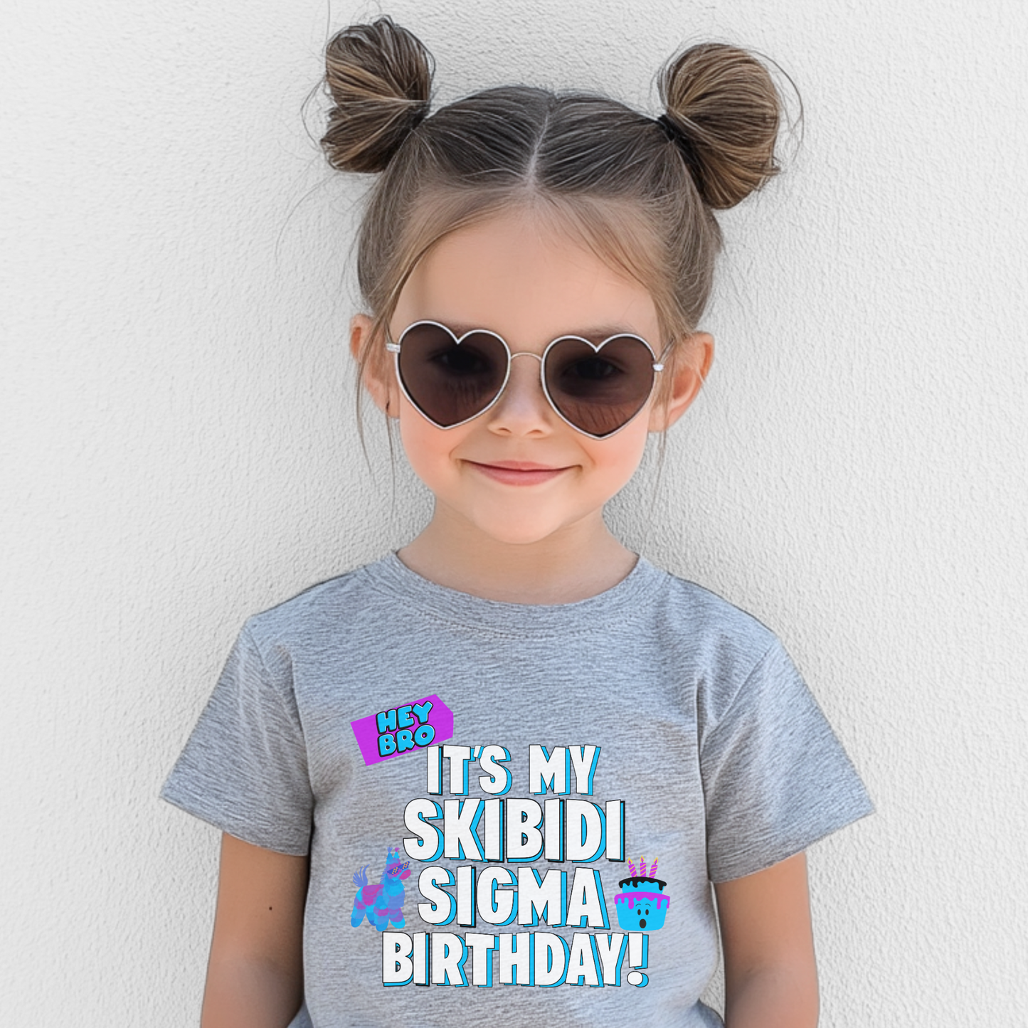 Perfect for tweens, teens, boys, and girls, this “Hey Bro! It’s my Skibidi Sigma Birthday!” kids’ T-shirt makes a hilarious birthday statement with viral Skibidi Toilet humor. Designed for gamer kids who love memes, this shirt is available in Navy, White, Black, and Sport Grey, offering a fun, soft, and stylish choice for parties, school, or everyday birthday fun. Great for Sigma bro fans!