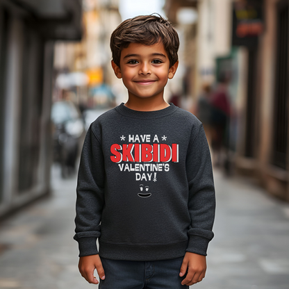 Funny Valentine’s Day sweatshirt for kids who love Skibidi, Rizz, and meme culture. This youth-size pullover features “Have a Skibidi Valentine’s Day!” in bold gamer-style lettering. Perfect for tweens into viral jokes, gaming trends, and funny internet content. Available in black and dark heather grey, this 50/50 cotton-poly fleece sweatshirt is cozy, durable, and just right for a Valentine's classroom party or tween meme-themed outfit.