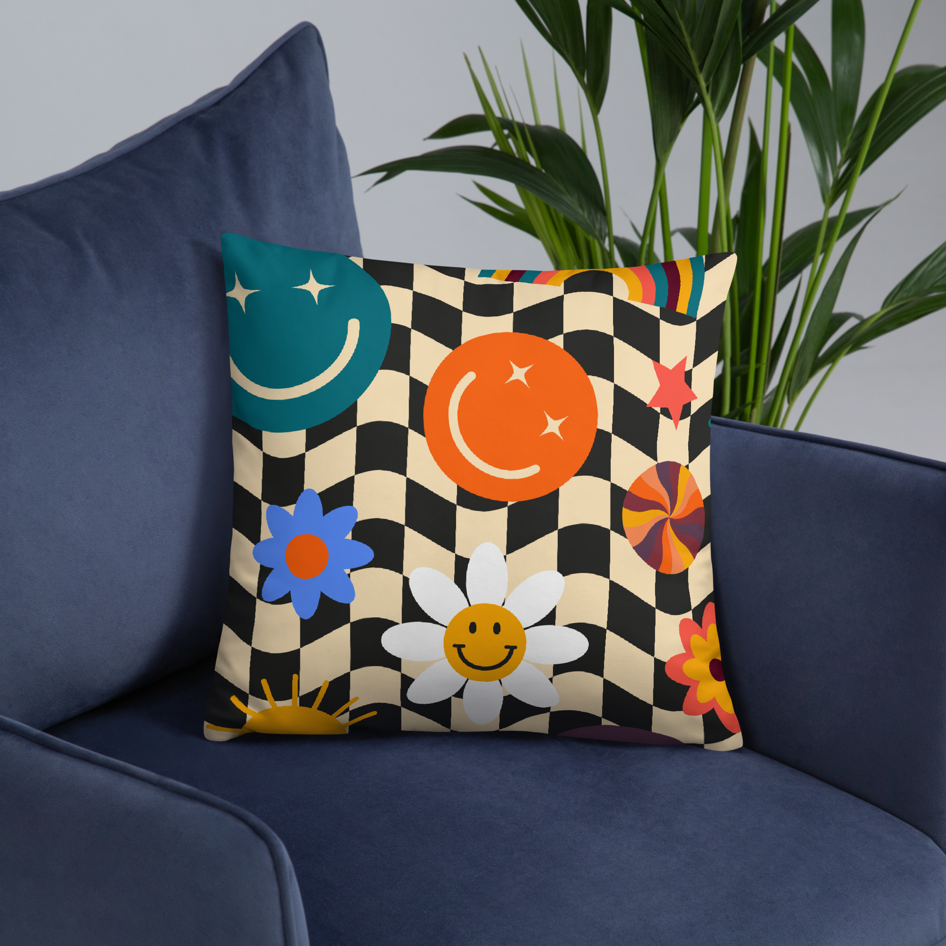 Square Y2K smiley face checkerboard throw pillow displayed on a blue couch, showing how the cheerful black and tan check pattern with bright smiley icons pops against colorful furniture. Soft girl aesthetic and retro Y2K vibes make this decorative accent perfect for teen bedrooms, dorm rooms, or cozy living spaces. Double-sided printed pillow adds playful personality, comfort, and style, making it a fun gift or trendy home décor update.