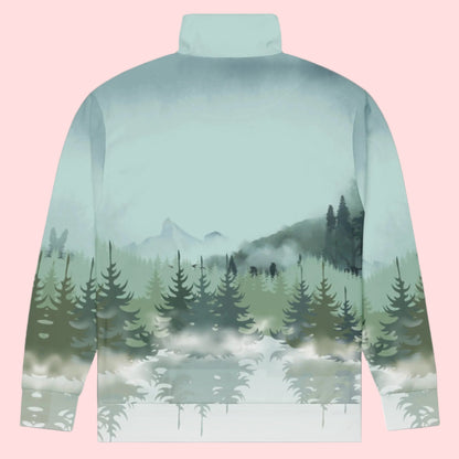 Image: Winter Forest Unisex Track Jacket. This nature inspired workout jacket has an ombre snowy mountain print that fades from a blue gray sky to mountains and pine trees to white snow. Suitable for men and women, by jaecrece