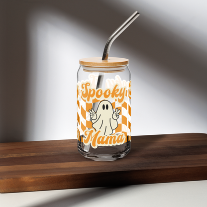 Eco friendly Halloween iced coffee glass with lid and straw, Spooky Mama ghost cup designed for stylish fall sipping. Durable 16 oz glass tumbler with trendy orange pattern. Perfect spooky season gift for women who love cute drinkware, iced coffee, or themed Halloween home decor. Ideal for mamas, teachers, and friends.
