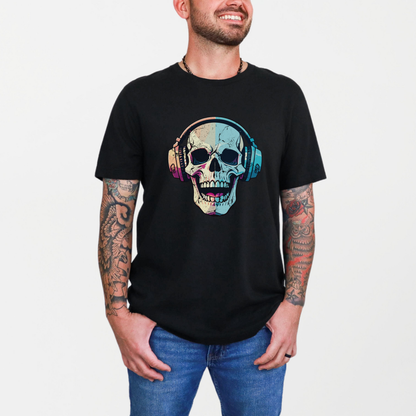 Man wearing a black short sleeve t-shirt featuring a vibrant graphic of a skull wearing headphones. The design is centered on the chest and stands out against the dark fabric, shown on a plain background to highlight the artwork and overall fit of the shirt.