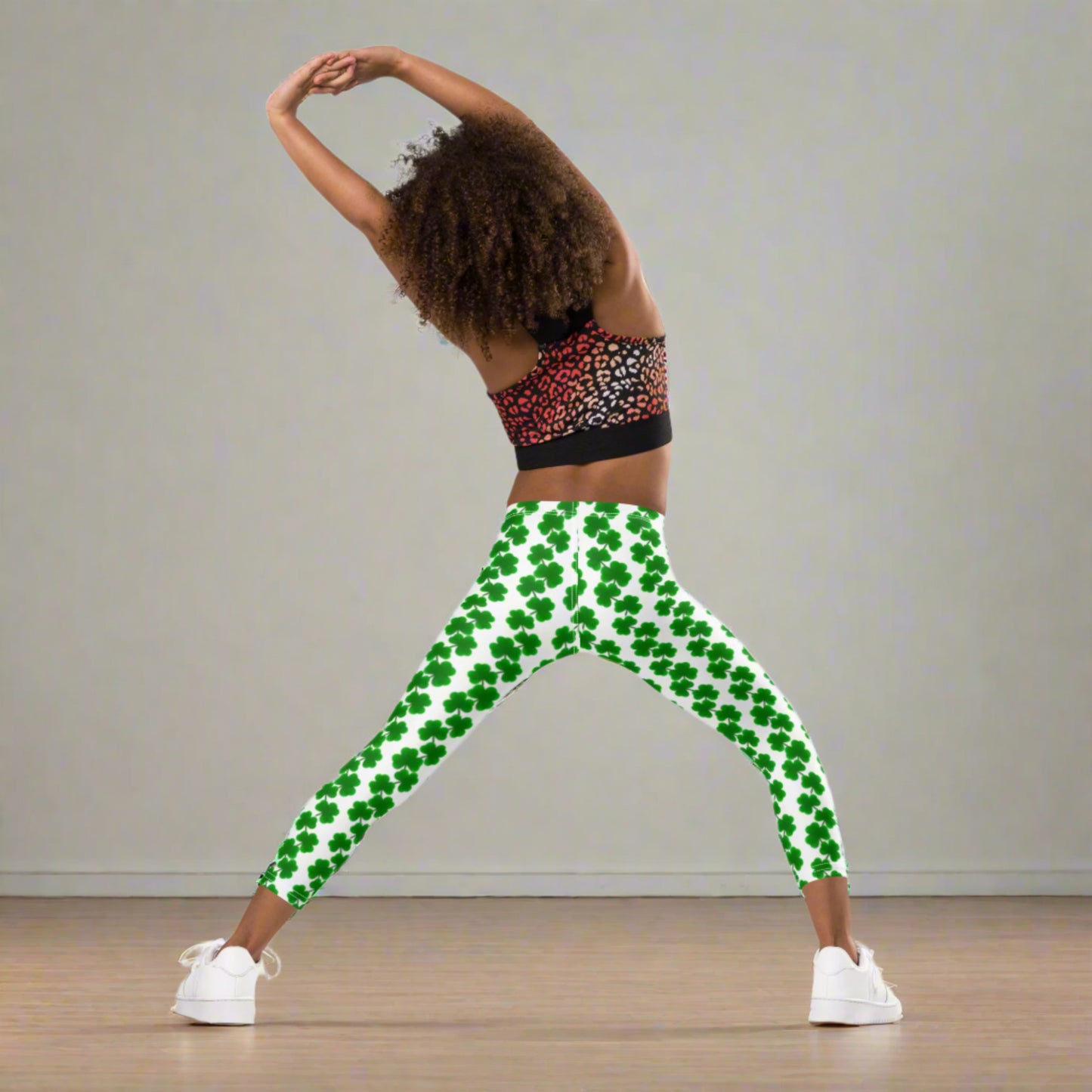 Image: St Patricks Day Leggings for toddlers and girls. Great white tights with a pattern of four leaf covers repeating down each leg. Also available in tween girl and womens sizes for family matching outfits, by jaecrece