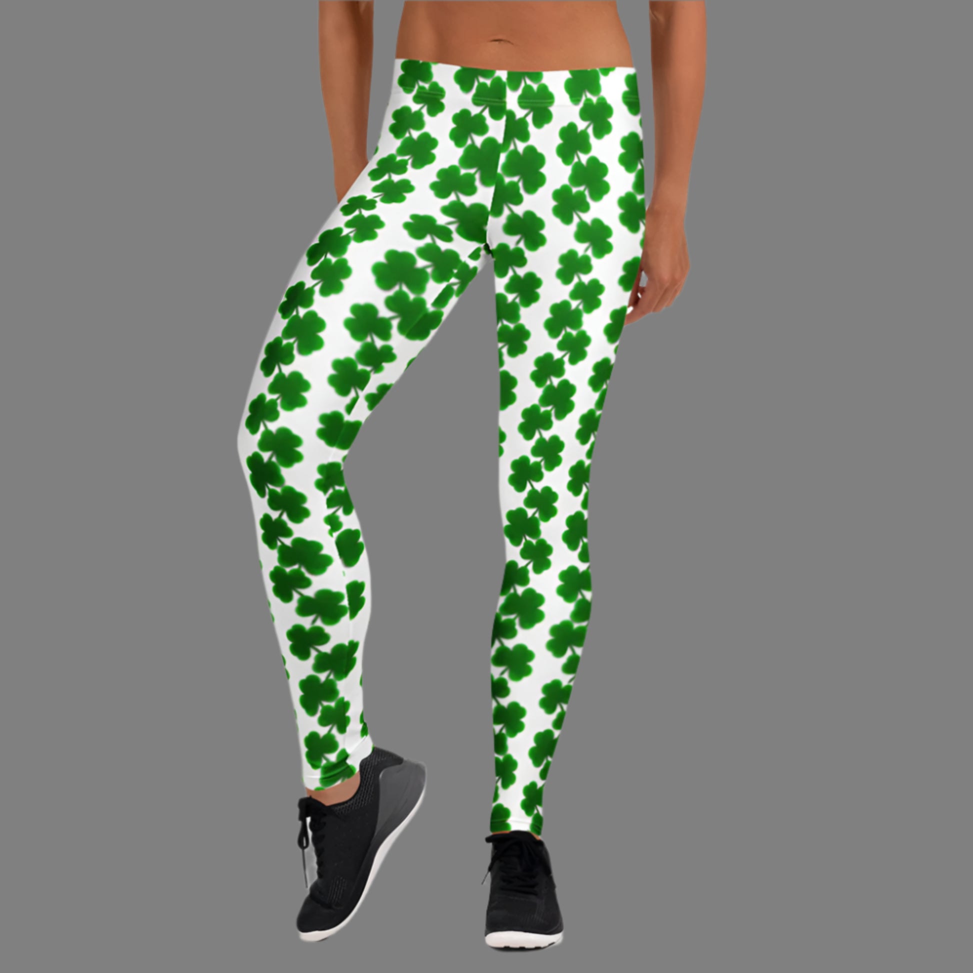 Image: St Patricks Day Leggings for toddler girls, tween, teens and women. These women’s St. Patrick’s Day leggings feature an all-over shamrock design on a white background with a mid-rise waistband and full-length legs. Designed for comfort and flexibility, they’re ideal for festive holiday looks, casual wear, or matching with kids for a coordinated family outfit. Available in sizes XS to XL, these fun leggings are perfect for celebrating in style.