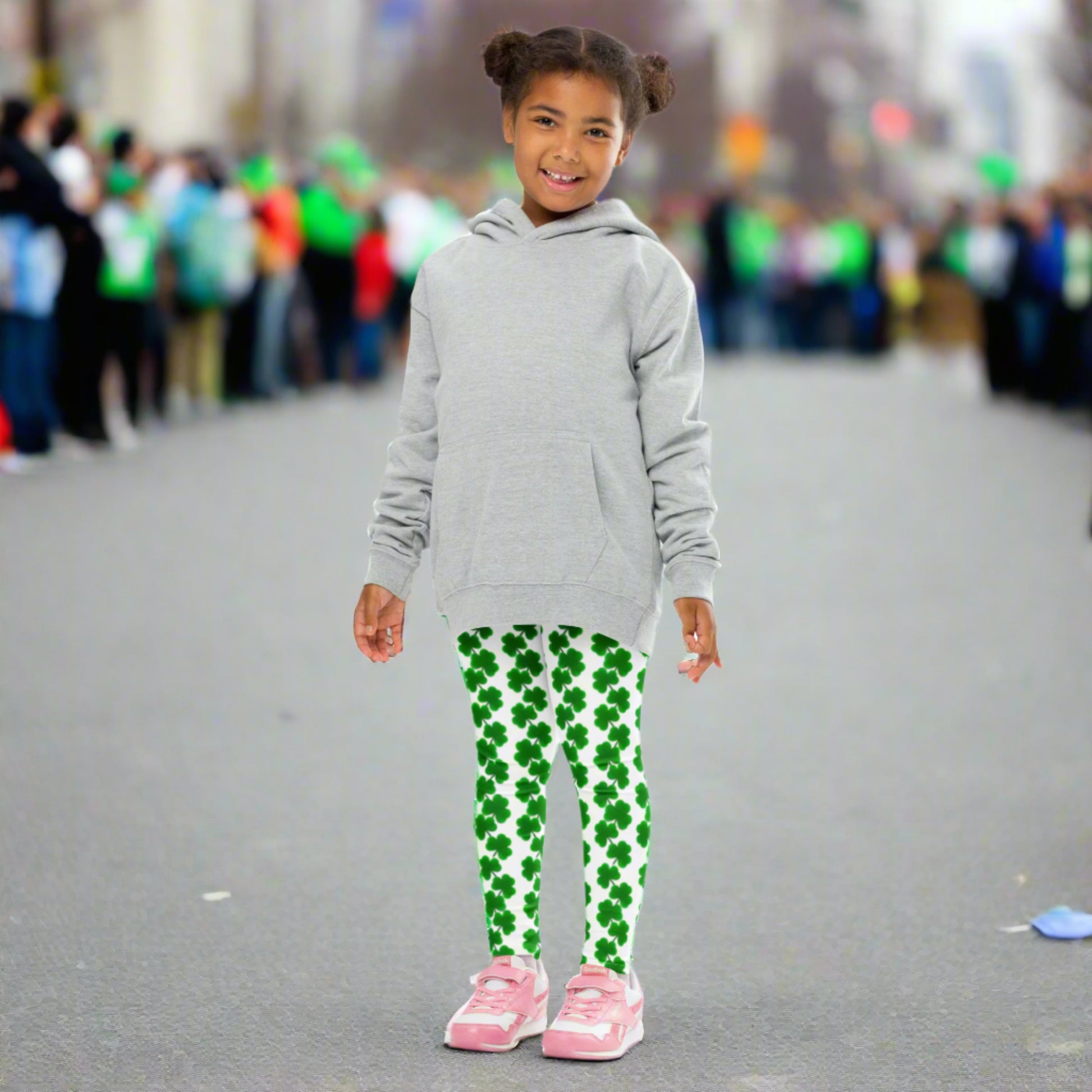 Image: St Patricks Day Leggings for toddlers and girls. In sizes 2T–7, these girls’ shamrock leggings bring Irish charm to your little one’s wardrobe. Full-length with a high-rise waistband, they’re comfy and cute with a bright white background and clover chain print. Ideal for toddlers and kids to wear for St. Patrick’s Day events or to match with siblings and mom. Also available in tween girl and womens sizes for family matching outfits, by jaecrece