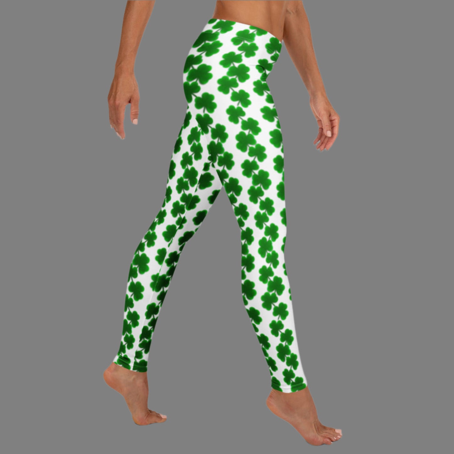 Image: St Patricks Day Leggings for women. These yoga pants are white with a green shamrock pattern. These shamrock print leggings for women feature a mid-rise waist and full-length fit, making them perfect for St. Patrick’s Day celebrations or cozy wear any time. The white background is accented with bright green shamrocks in a repeating chain pattern. Great for Irish-themed parties, March family photos, or matching with kids’ leggings for a mom-and-me holiday outfit.

