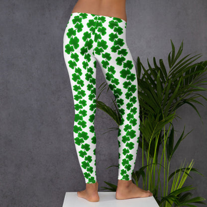 Image: St Patricks Day Leggings for toddler girls, tween, teens and women. Women’s shamrock leggings with mid-rise fit and full-length ankle coverage feature a playful St. Patrick’s Day design with green clovers printed on a bright white background. Perfect for holiday festivities, Irish celebrations, or matching family sets. These stretchy leggings are soft, comfy, and fun—ideal for mamas wanting festive athleisure in sizes XS through XL.