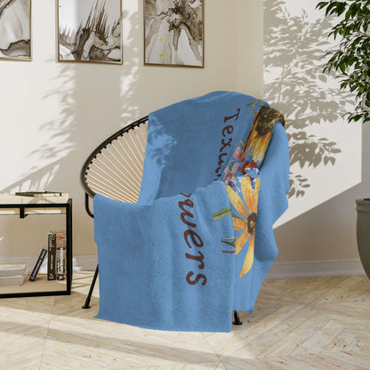 The Texas Wildflowers Plush Blanket showcases beautiful watercolor flowers on a soft, lightweight throw. With bluebonnets and state flower details, this cozy floral blanket makes a charming addition to any cottagecore nursery, farmhouse bedroom, or gift basket. Ideal for spring home styling, this botanical blanket also appeals to southern women and floral pattern lovers.