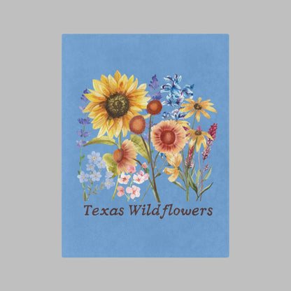 Celebrate spring and state pride with this watercolor floral plush blanket featuring Texas wildflowers like bluebonnets and Indian paintbrush. Ideal for nurseries, reading corners, or cottagecore homes, this throw is cozy and beautiful. A thoughtful floral gift for moms, southern decor fans, or gardeners, this blanket adds warmth and regional charm to your space.

11.
Bring a touch of Texas beauty to your home with this watercolor wildflower blanket. Featuring bluebonnets, sunflowers, and soft pastel blooms